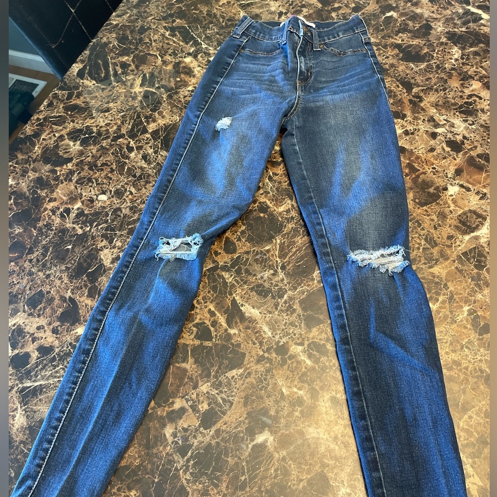 Blue ripped jeans